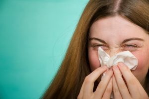 woman suffering from allergies 