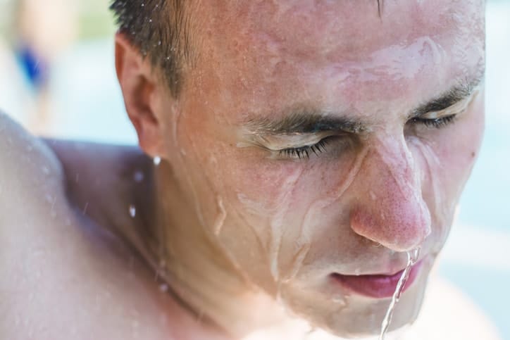 Swimmer Draining Water From His Ears