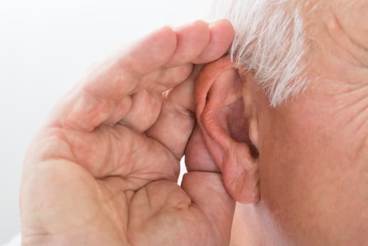 Close-up Of A Man Trying To Hear