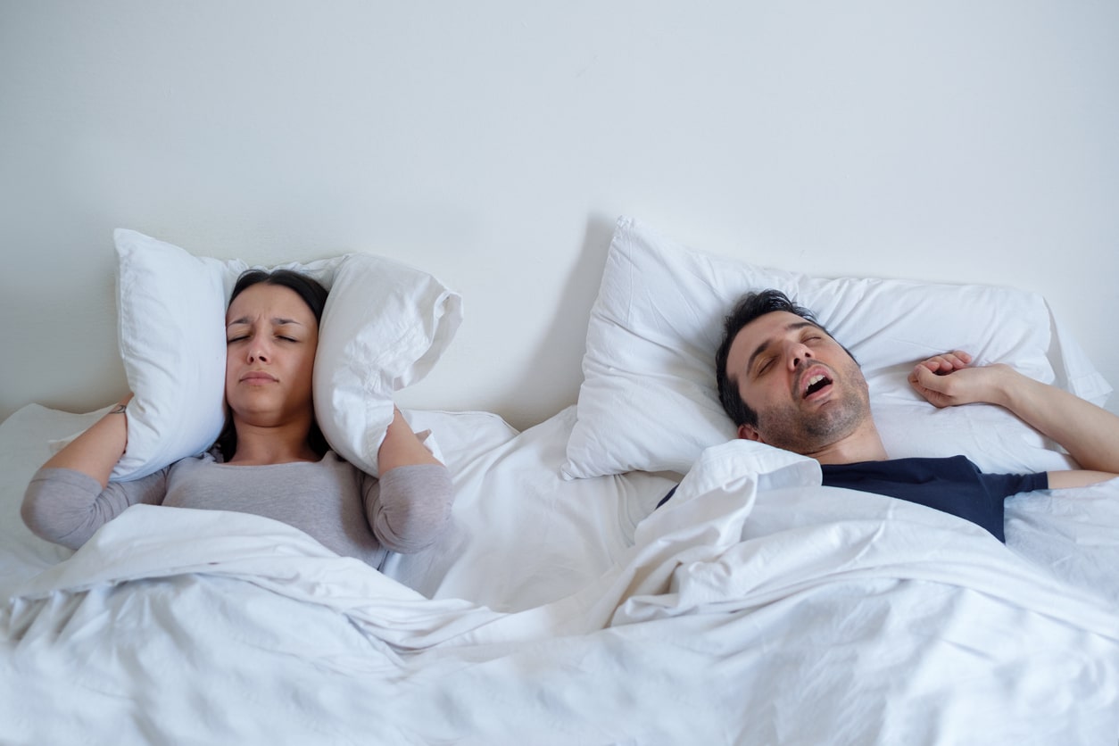 Young couple suffering from Sleep Apnea